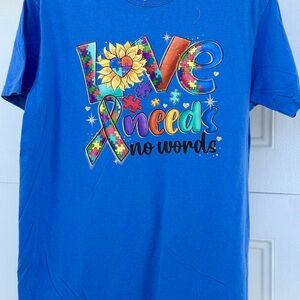 Blue "Love Needs No Words" Puzzle Ribbon Graphic Tee